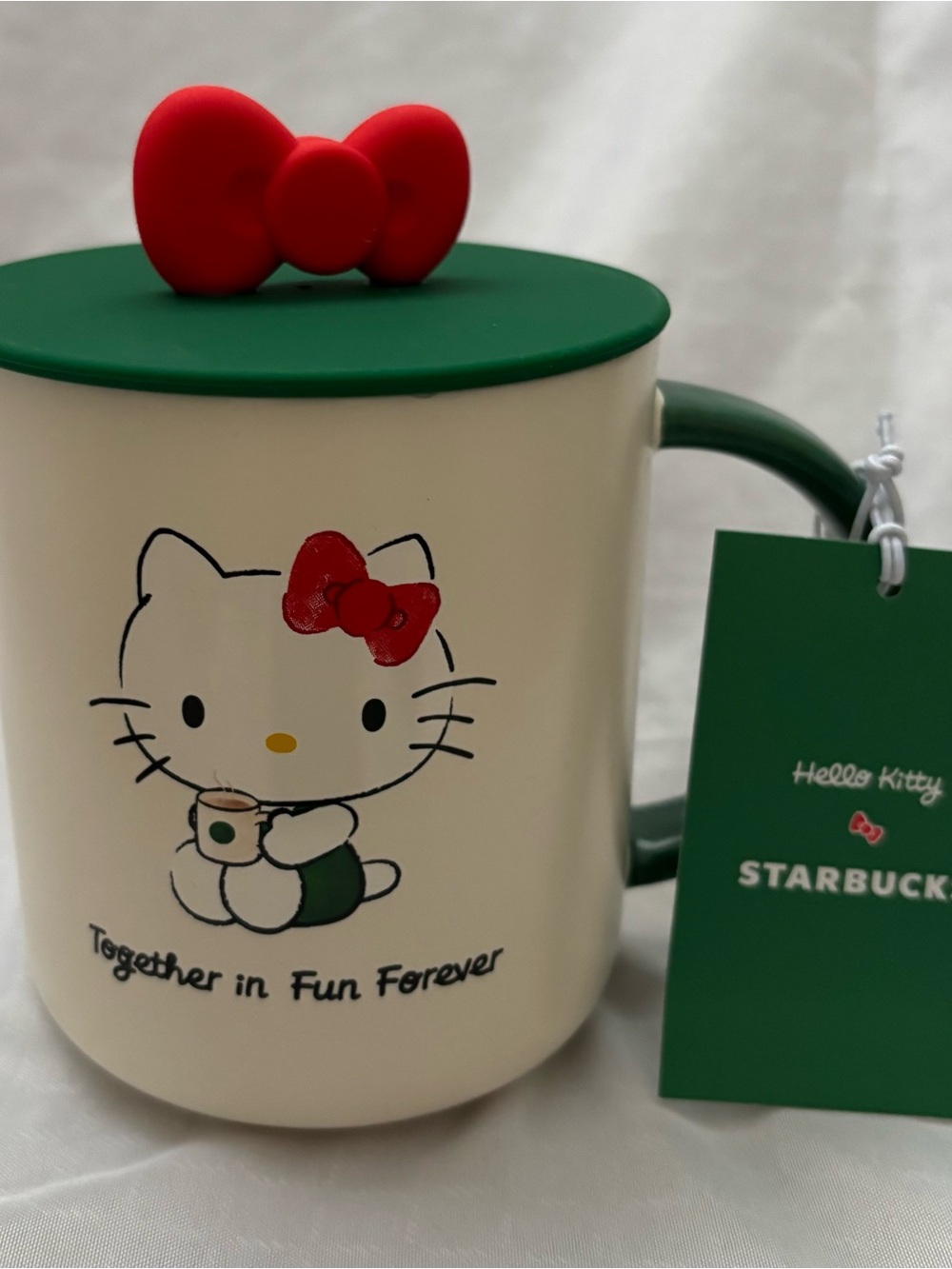 Starbucks Cream Ceramic Mug with Green Lid and Red Accent